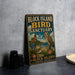 A vintage-style metal sign for the Block Island Bird Sanctuary in Rhode Island, featuring an illustration of an owl and a lighthouse.