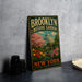A vintage-style metal sign for the Brooklyn Botanic Garden, featuring a colorful illustration of the garden and a dome-shaped building.
