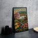 A vintage-style metal sign for "Brookside Gardens Maryland" is displayed on a gray countertop, featuring a garden scene with flowers and a building.