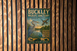 A vintage metal sign for the Buckley Wildlife Sanctuary in Audubon, Kentucky, featuring an illustration of a heron and a duck.