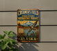 A vintage metal sign for Creamer's Field Migratory Waterfowl Refuge in Alaska, featuring a scenic illustration of ducks flying over a lake surrounded by mountains.