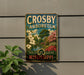 A vintage metal sign for the Crosby Arboretum in Mississippi, featuring a scenic landscape with trees, flowers, and a pond.