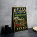 A vintage-style metal sign for the Dallas Arboretum and Botanical Garden, featuring a scenic landscape with a pond, flowers, and a domed structure.