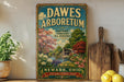 A vintage-style sign for the "DAWES ARBORETUM" nursery in Newark, Ohio, established in 1929. The sign features a scenic illustration of a garden with trees, flowers, and a pond.
