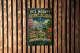A vintage-style metal sign for the Des Moines Botanical Garden in Iowa, featuring a colorful illustration of the garden's architecture and flowers.
