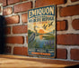 A vintage-style metal sign for the Emiquon National Wildlife Refuge in Illinois, featuring an illustration of a bird and a sunset over a body of water.