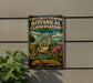 A vintage metal sign for the Foellinger-Freimann Botanical Conservatory in Indiana, featuring a large glass greenhouse surrounded by tropical plants and flowers.