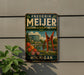 A vintage-style metal sign for the Frederick Mejer Gardens & Sculpture Park in Michigan, featuring a large sculpture and a scenic landscape.