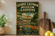 A vintage-style metal sign for the George Eastman Museum Gardens in Rochester, New York, featuring a painting of a garden with a fountain and flowers.