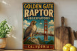 A vintage-style metal sign for the Golden Gate Raptor Observatory in California, featuring an illustration of a hawk perched on a rock with the Golden Gate Bridge in the background.