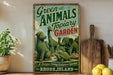 A vintage-style sign advertising a "Green Animals Topiary Garden" in Rhode Island, featuring a variety of topiary sculptures of animals and plants.
