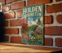 A vintage-style metal sign for the Holden Arboretum in Ohio, featuring a scenic illustration of a garden with a bridge and trees.