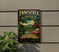A vintage-style sign for the Innisfree Garden in New York, featuring a scenic landscape with a pagoda and cherry blossom trees.