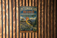 A vintage-style metal sign for the Intermountain Bird Observatory in Idaho, featuring a colorful illustration of a bird and text promoting bird research, conservation, and education.