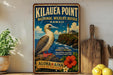 A vintage-style metal sign for the Kilauea Point National Wildlife Refuge in Hawaii, featuring a bird and a lighthouse on a cliff overlooking the ocean.