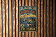 A vintage-style metal sign for Klath Basin Birding Trail in California, featuring illustrations of various bird species in a natural setting.