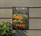 A vintage-style metal sign for the Laguna Atascosa National Wildlife Refuge in Texas, featuring illustrations of birds and a sunset landscape.