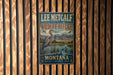 A vintage metal sign for Lee Metcalf National Wildlife Refuge in Montana, featuring a large heron and mountains in the background.