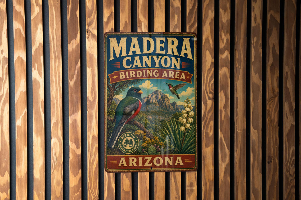 A vintage metal sign for Madera Canyon, Arizona, featuring a bird and a mountain landscape.