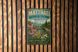 A vintage-style metal sign for Matthaei Botanical Gardens in Michigan, featuring a scenic illustration of a garden with flowers and a building.