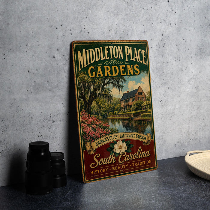 A vintage-style metal sign for "Middleton Place Gardens" is displayed on a gray countertop, featuring a scenic landscape with a house and garden.