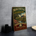 A vintage-style metal sign for "Middleton Place Gardens" is displayed on a gray countertop, featuring a scenic landscape with a house and garden.