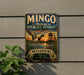 A vintage-style metal sign for the Missouri National Wildlife Refuge, featuring a duck in flight and a tower in the background, mounted on a wall.