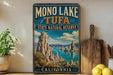 A vintage-style sign for the Mono Lake State Natural Reserve in California, featuring a scenic landscape with mountains, water, and a lake.