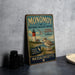 A vintage metal sign for the Monomoy National Wildlife Refuge in Massachusetts, featuring a lighthouse and a bird, is displayed on a gray countertop.