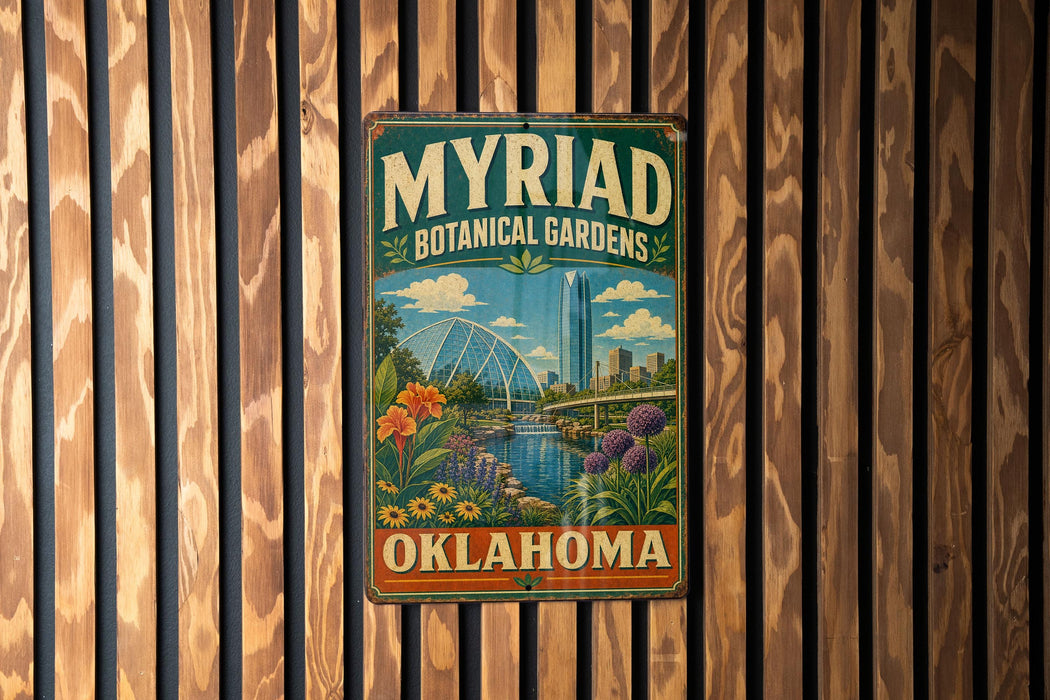 A vintage-style metal sign for the Myriad Botanical Gardens in Oklahoma, featuring a scenic illustration of the gardens and a city skyline.