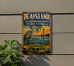 A vintage-style metal sign for Pea Island National Wildlife Refuge in North Carolina, featuring a large heron and a lighthouse in the background.