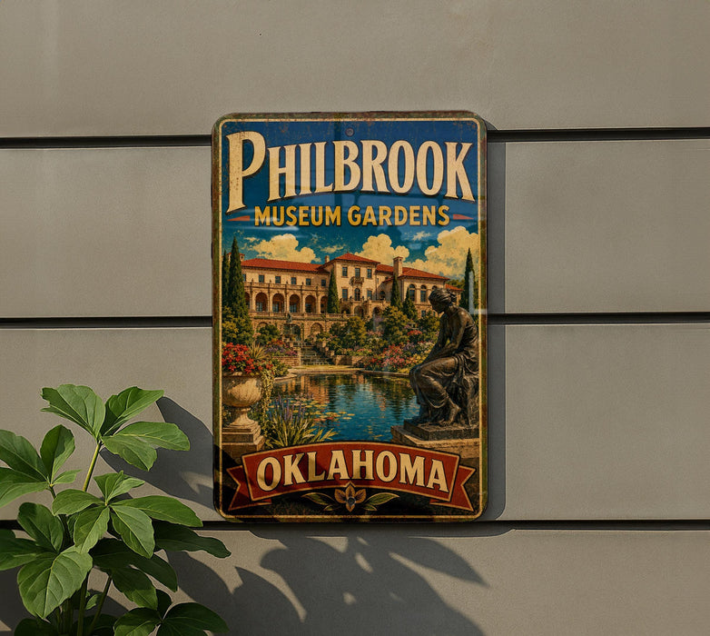 A vintage-style sign for the Philbrook Museum Gardens in Oklahoma, featuring a scenic image of the museum gardens and a statue.