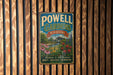 A vintage metal sign for Powell Gardens in Missouri, featuring a scenic landscape with flowers and a waterfall.