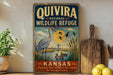 a vintage-style sign for the Quivira National Wildlife Refuge in Kansas, with a bird illustration and text promoting the refuge's conservation efforts.