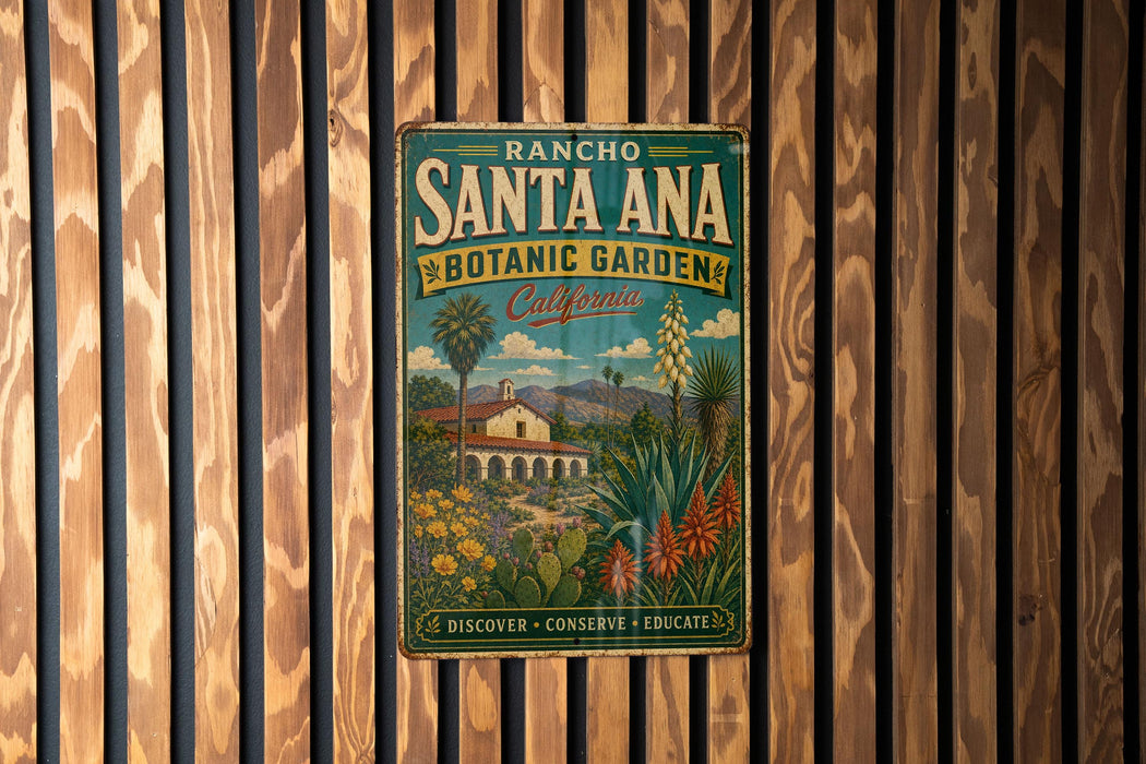 A vintage-style metal sign for the Rancho Santa Ana Botanic Garden in California, featuring a colorful illustration of a garden and a house.