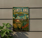A vintage-style metal sign for the Rancho Santa Ana Botanic Garden in California, featuring a colorful illustration of a desert landscape with a building and palm trees.