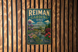A vintage-style metal sign for Reiman Gardens in Iowa, featuring a greenhouse and colorful flowers, is displayed on a wooden wall.