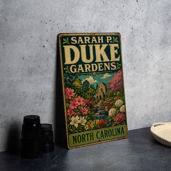 A vintage-style metal sign for "Sarah P. Duke Gardens" in North Carolina, featuring a colorful illustration of a garden landscape.