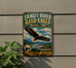 A vintage-style metal sign for the Skagit River Bald Eagle Natural Area, featuring an eagle in flight and a scenic landscape.