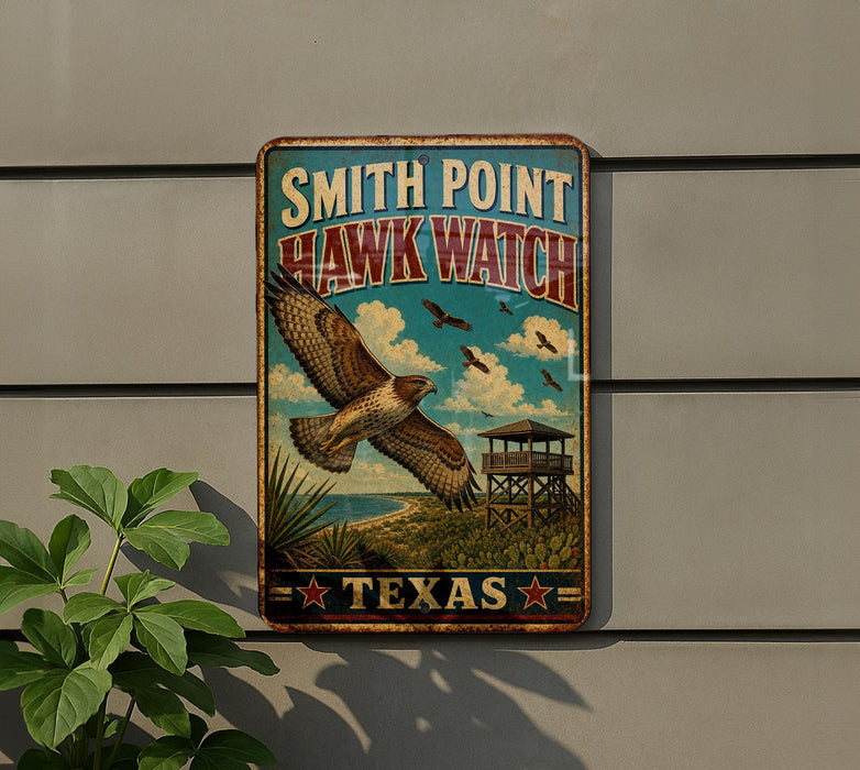 A vintage-style metal sign for Smith Point Hawk Watch in Texas, featuring an illustration of a hawk in flight and a lookout tower.