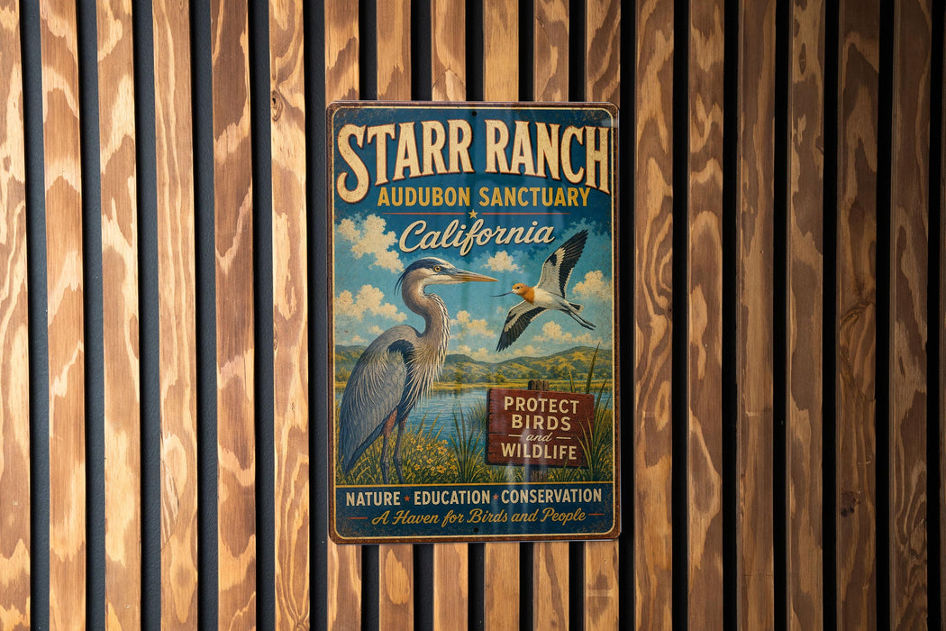 A vintage metal sign for the Starr Ranch Audubon Sanctuary in California, featuring an illustration of a heron and the text "PROTECT BIRDS AND WILDLIFE".