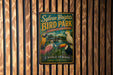 A vintage-style metal sign for Sylvan Heights Bird Park, featuring colorful illustrations of various birds and a scenic landscape.