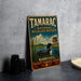 A vintage-style metal sign for Tamarac National Wildlife Refuge in Minnesota, featuring an illustration of a bird and a birdhouse.