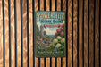 A vintage-style metal sign for Tower Hill Botanic Garden in Boston, Massachusetts, featuring a lush garden scene with a tower and flowers.