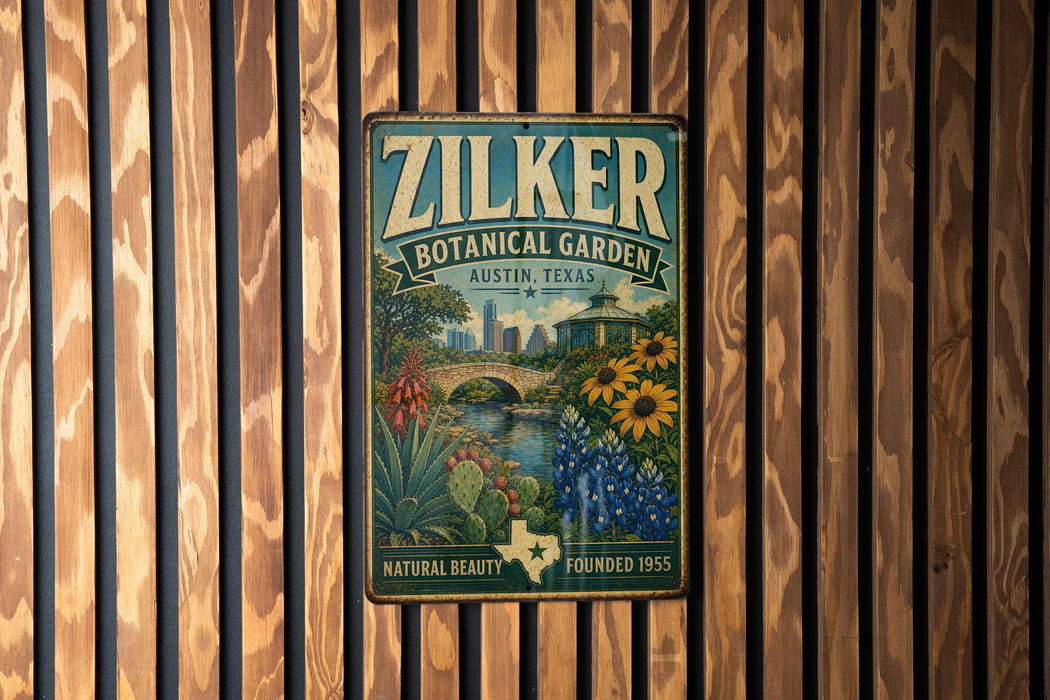 A vintage-style metal sign for the Zilker Botanical Garden in Austin, Texas, featuring a colorful illustration of a garden with flowers, plants, and a bridge.