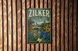 A vintage-style metal sign for the Zilker Botanical Garden in Austin, Texas, featuring a colorful illustration of a garden with flowers, plants, and a bridge.