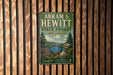 A vintage-style metal sign for Abraham S. Hewitt State Forest in New Jersey, featuring a scenic landscape with a waterfall and pine trees.