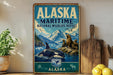 A vintage-style metal sign for the Alaska Maritime National Wildlife Refuge, featuring an illustration of a whale, seals, and mountains.