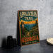 A vintage-style metal sign for the Appalachian Trail in Georgia, featuring a scenic mountain landscape with a trail marker and the text "Appalachian Trail Georgia Walk the Legend".