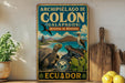 a vintage-style metal sign with a tropical landscape, including a large tortoise, a bird, and cacti, along with the text "ARCHIPIELAGO DE COLON (GALAPOS)" and "RESERVA DE BIOSFERA".